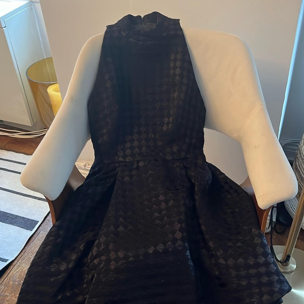 Halter neck sleeveless sleek black party dress